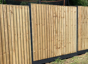 Using steel fence posts with wooden fence panels